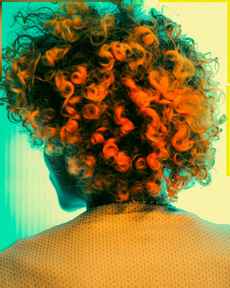 Back view of copper-toned curls