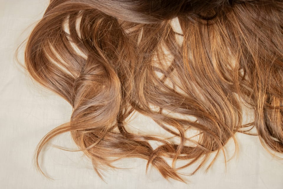 Soft brown curls in close detail